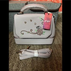 Ginger tagged handbag ( colour purple)